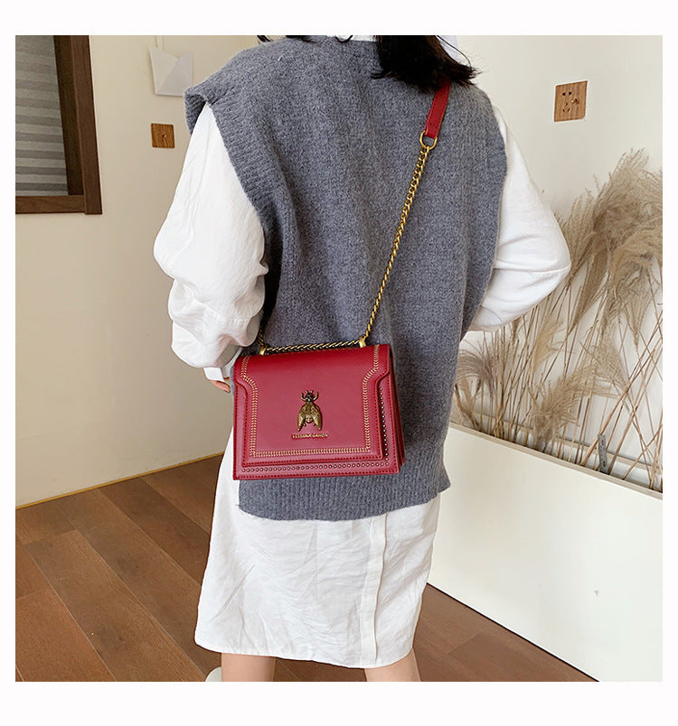 Valeria | Borsa a tracolla vintage con dettagli artigianali e catena dorata