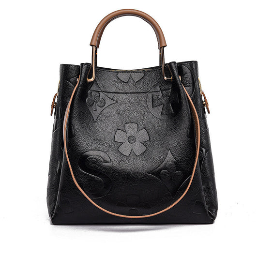 Lucia | Borsa a secchiello vintage testurizzata con pochette removibile