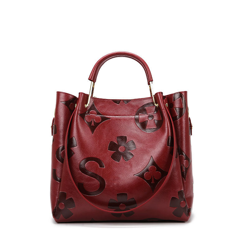 Lucia | Borsa a secchiello vintage testurizzata con pochette removibile