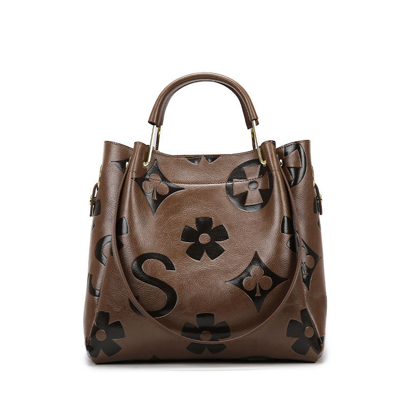 Lucia | Borsa a secchiello vintage testurizzata con pochette removibile