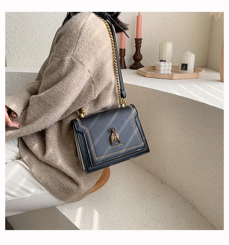 Valeria | Borsa a tracolla vintage con dettagli artigianali e catena dorata