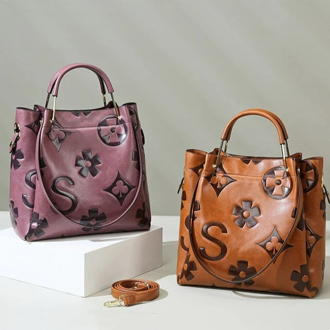 Lucia | Borsa a secchiello vintage testurizzata con pochette removibile