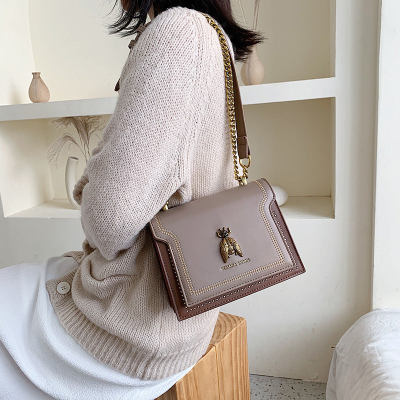 Valeria | Borsa a tracolla vintage con dettagli artigianali e catena dorata