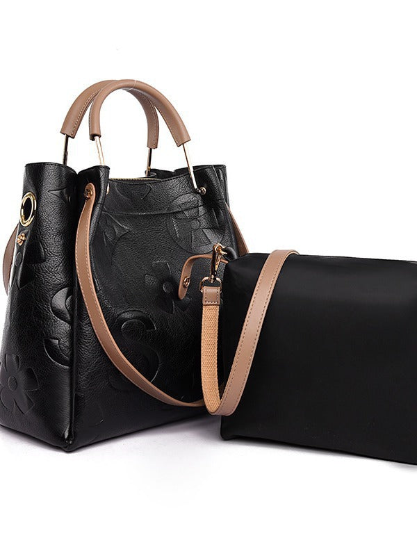 Lucia | Borsa a secchiello vintage testurizzata con pochette removibile
