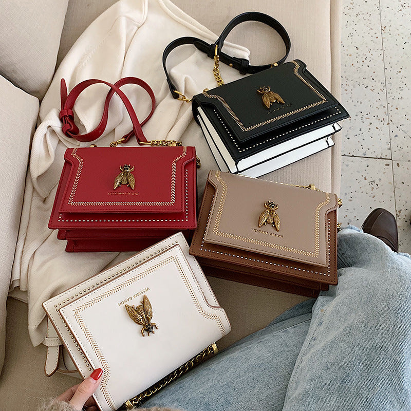 Valeria | Borsa a tracolla vintage con dettagli artigianali e catena dorata