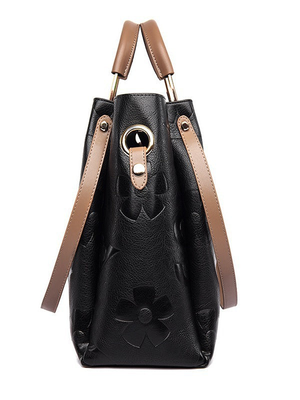 Lucia | Borsa a secchiello vintage testurizzata con pochette removibile
