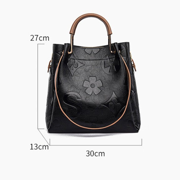 Lucia | Borsa a secchiello vintage testurizzata con pochette removibile