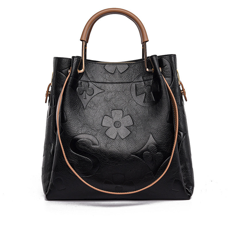 Lucia | Borsa a secchiello vintage testurizzata con pochette removibile