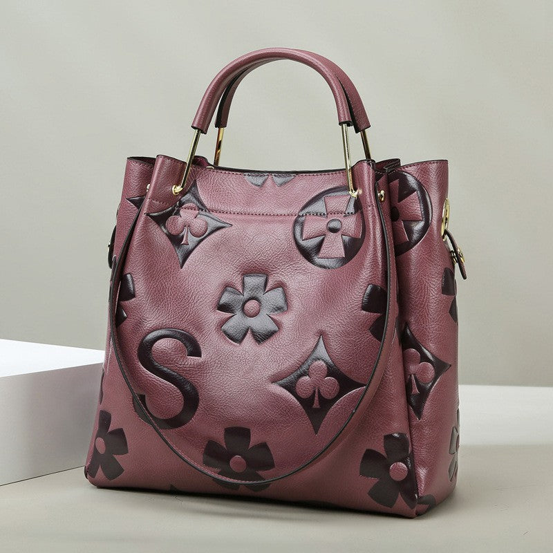 Lucia | Borsa a secchiello vintage testurizzata con pochette removibile