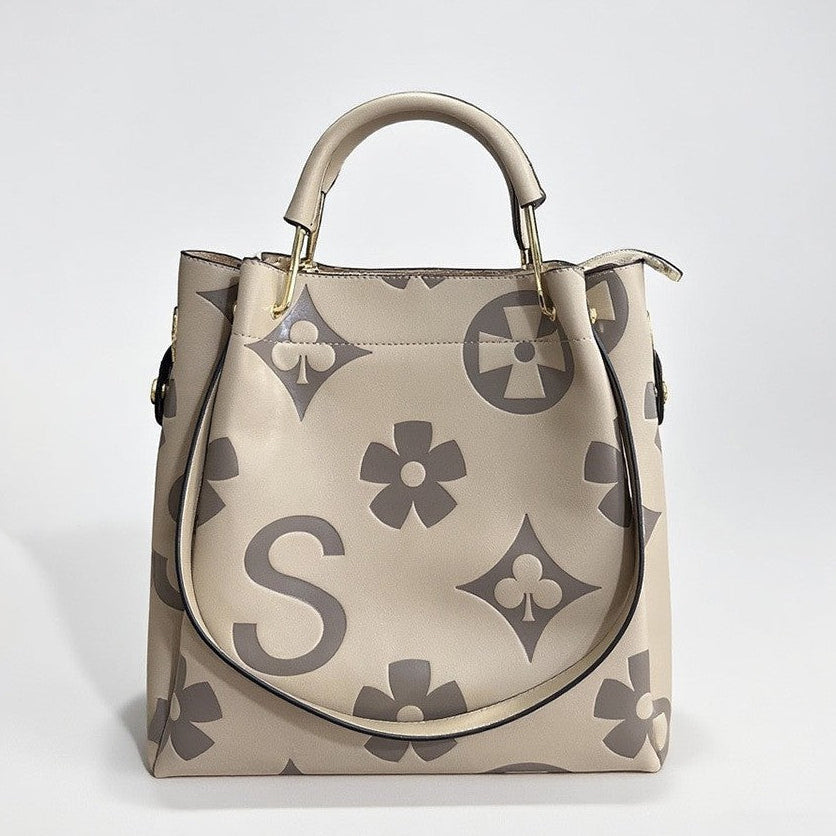 Lucia | Borsa a secchiello vintage testurizzata con pochette removibile
